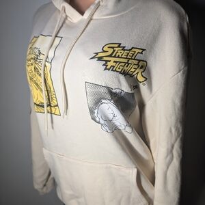 Street Fighter graphic panels Men's Cream Colored Hoodie Size M